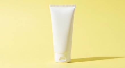 White Tube on Yellow Background