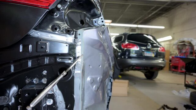 Element car body repair after an accident at auto body shop. 