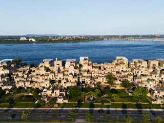 The sunset view of apartment Habitat 67 near to St. Lawrence River, Montreal, Canada. Drone view