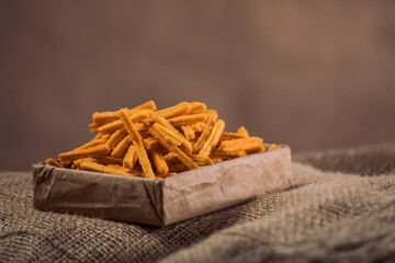  Orange Cheese Snacks on White Background – Rustic Crunchy Treats