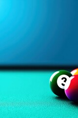 Pool balls on a teal table against a deep blue background