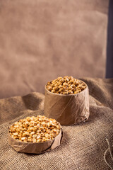 Split Roasted Chickpeas on Burlap Fabric – Rustic Healthy Snack