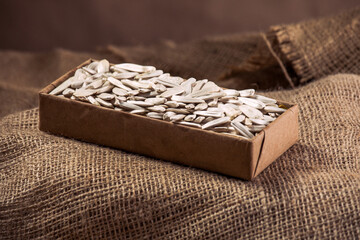 White Sunflower Seeds in Paper Bowls – Eco-Friendly Snack Presentation