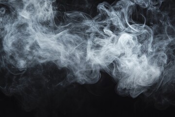 Abstract swirling grey smoke against a black background