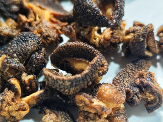 Snail chips are a typical Indonesian snack that is famous for being delicious, savory and crunchy.