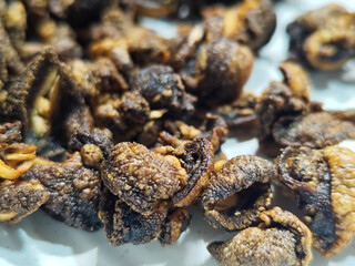 Snail chips are a typical Indonesian snack that is famous for being delicious, savory and crunchy.