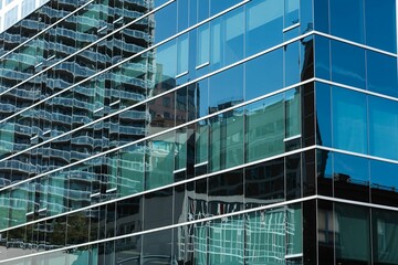 Close-up of glass office building © vectorfusionart