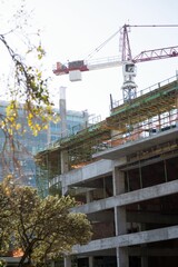 Crane and building construction site