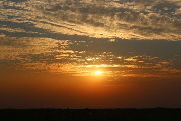 Sunset over the horizon, a breathtaking view of the sky