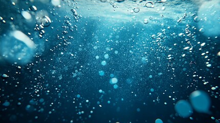 Magical deep underwater scene with soft glowing light rays, rising bubbles, and a calm serene atmosphere in crystal clear blue ocean depths for tranquil aquatic backgrounds

