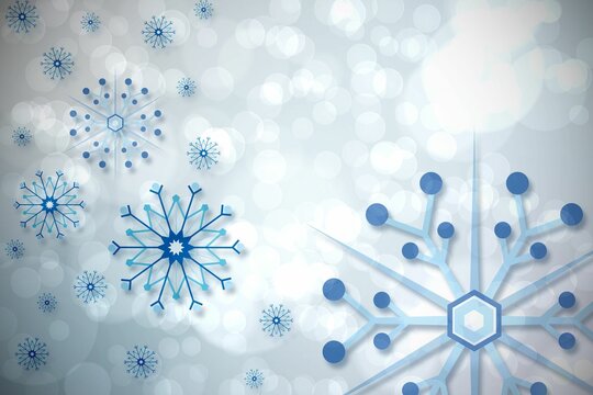 Fototapeta Blue snowflake pattern on twinkling lights