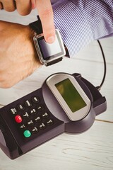 Man using smart watch to express pay