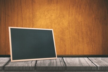 Black board on a wooden table