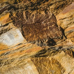 Sedimentary rock outcrop is showing layered strata in flat design, with mineral veins and fissures