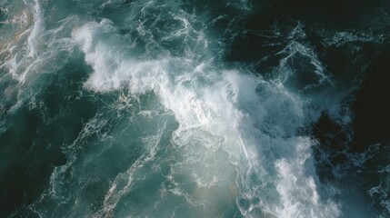 Fototapeta na wymiar Aerial View of Massive Ocean Wave Patterns with Churning Foamy Surface Showing Raw Natural Power for Weather and Marine Industry Marketing