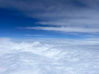 Infinite Cloudscape Under Blue Sky
