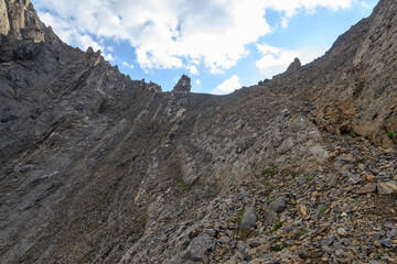 Ascent with hiking footpath towards mountain Col des Chamois in Swiss Alps, Switzerland
