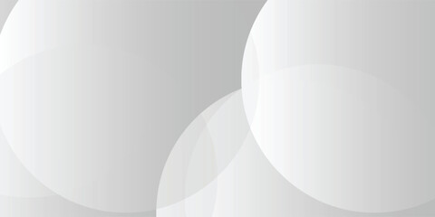 A minimalist abstract background featuring overlapping curves and circular shapes in various shades of gray, creating a smooth gradient and subtle depth vector eps10