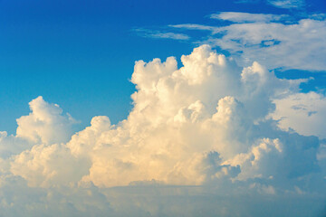 Dreamy Blue Sky with Fluffy Clouds Evoking Tranquility and Peace