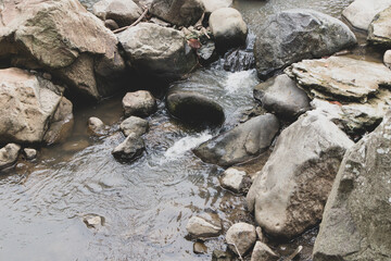 A streamlet with big stones 