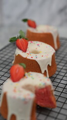 Strawberry Chiffon with white chocolate topping and strawberry pieces and colorful sprinkles