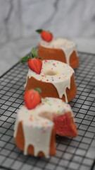 Strawberry Chiffon with white chocolate topping and strawberry pieces and colorful sprinkles