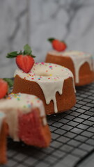 Strawberry Chiffon with white chocolate topping and strawberry pieces and colorful sprinkles