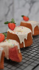 Strawberry Chiffon with white chocolate topping and strawberry pieces and colorful sprinkles