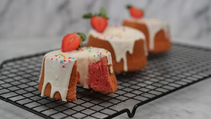Strawberry Chiffon with white chocolate topping and strawberry pieces and colorful sprinkles