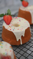 Strawberry Chiffon with white chocolate topping and strawberry pieces and colorful sprinkles