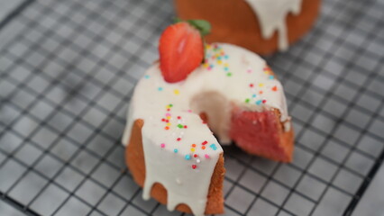 Strawberry Chiffon with white chocolate topping and strawberry pieces and colorful sprinkles