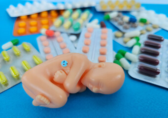 Model and treatment embryos in fetal medicine. Drugs for fetal treatment. Medical abortion. Taking...