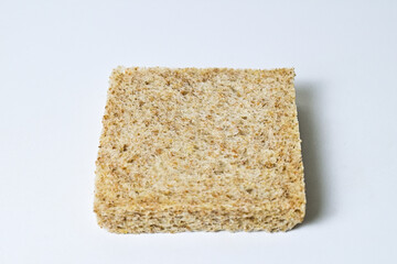Close up view of one whole wheat sliced bread with abstract product background. Isolated on white. Clipping path.