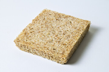 Close up view of one whole wheat sliced bread with abstract product background. Isolated on white. Clipping path.