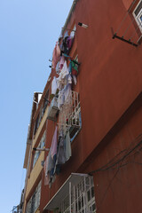 Clothes hanging to dry on a building facade in istanbul, turkey