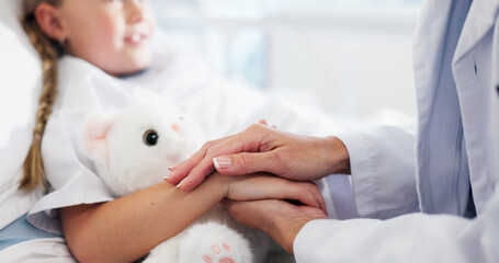 Holding hands, doctor and child on bed in hospital for healthcare medicine, support and trust....