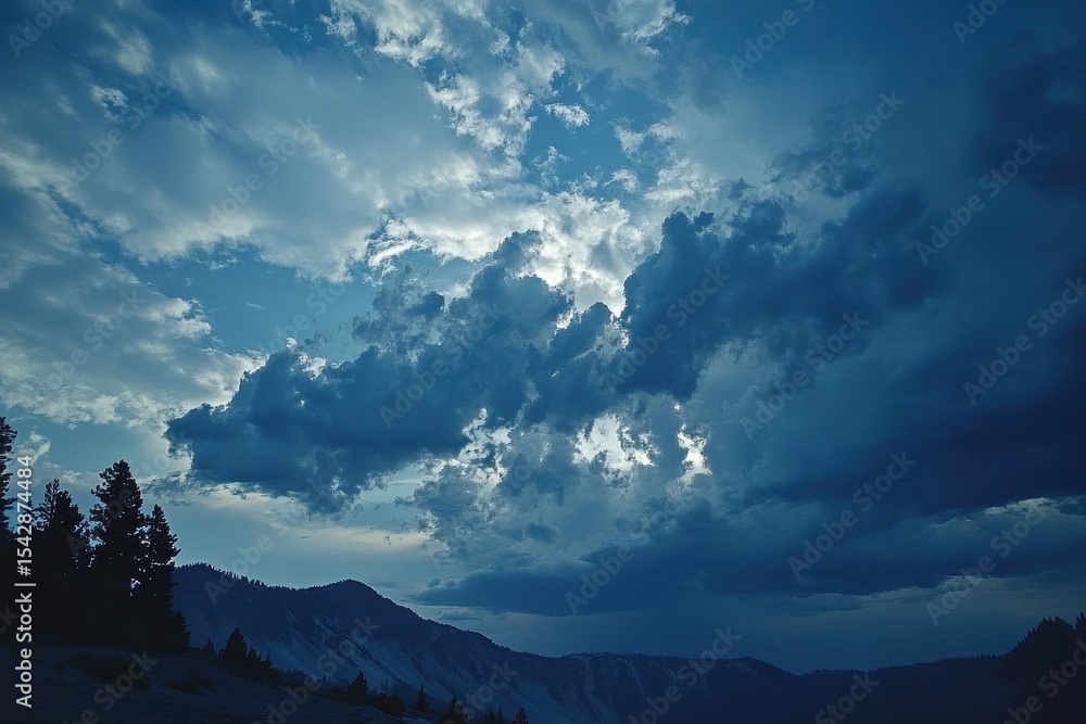 Poster Moving clouds create a dynamic sky above Crater Lake at twilight, Time lapse of clouds moving across the sky above Crater Lake in Oregon