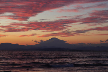 A scenic view of a sunrise or sunset, with warm tones painting the sky. Perfect for use as...