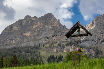Country cross on mountain path