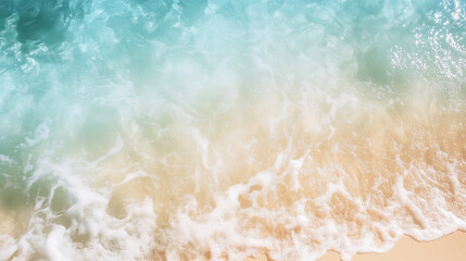 Aerial view of blue sea and white sandy beach.