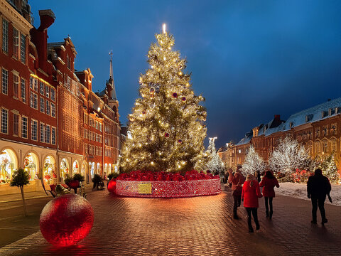Christmas Carols: Traditional Christmas carols, such as "Silent Night" and "Jingle Bells," are sung in churches, homes, and public spaces.   
Christmas Dinner: Families and friends - Powered by Adobe