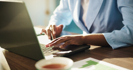 Business person, hands and typing with laptop for finance, statistics or corporate budget at...