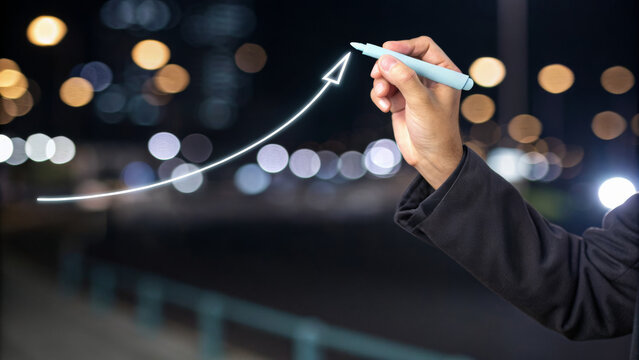 Hand marker arrow growth business success night city upward progress motivation concept finance urban. Inflation ,stagflation, recession and depression . Economic, financial crisis concept