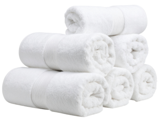 Six neatly rolled white towels stacked in a pyramid arrangement.