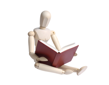 A wooden mannequin sits reading a book, isolated against a white background. - Powered by Adobe