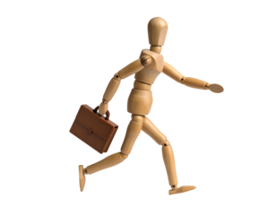 A wooden mannequin rushes, briefcase in hand, suggesting a busy workday.