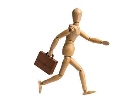 A wooden mannequin rushes, briefcase in hand, suggesting a busy workday.