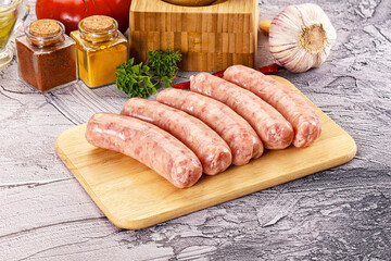 Raw meat sausages for grill