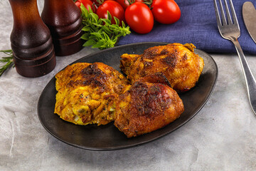 Roasted chicken thighs  with spices