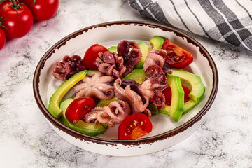Salad with baby octopus and avocado